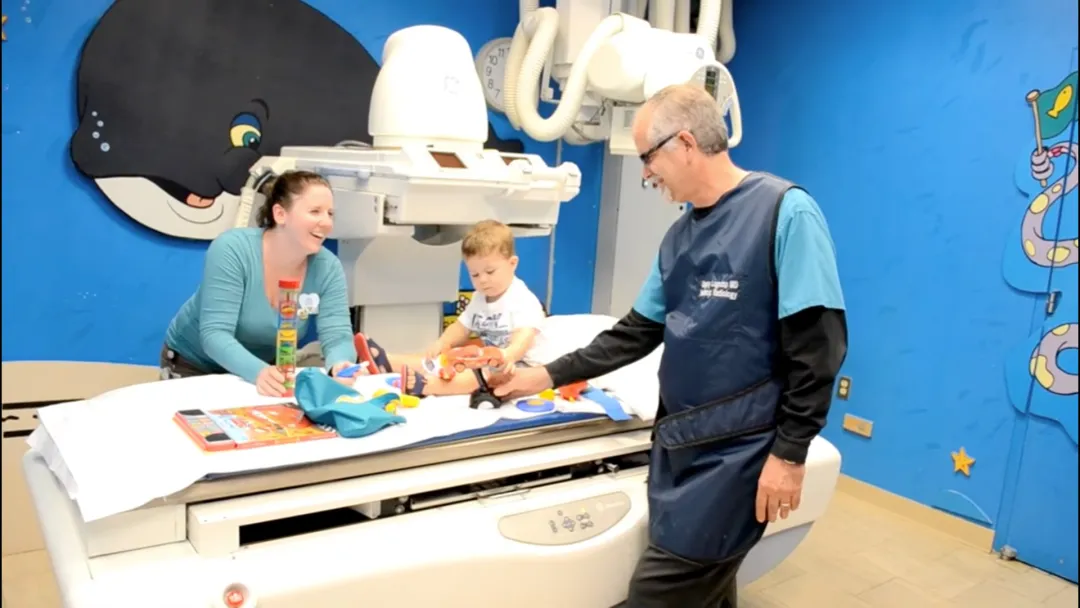 Pediatric Radiology/Imaging Patient with Two Providers Preparing to Take Some Imaging