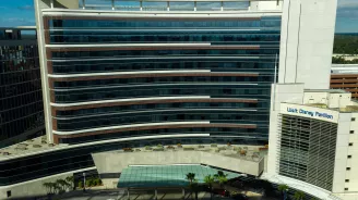 A front and panoramic view of the AdventHealth for Women building