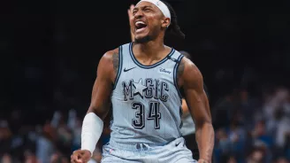 An Orlando Magic player at a basketball game.