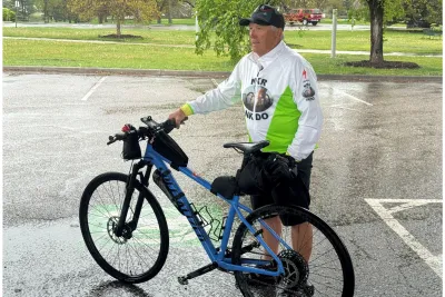 Mark Scotch being interviewed before riding to AdventHealth Porter.
