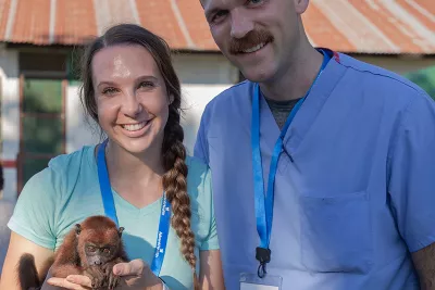 global-missions-peru-man-and-woman-with-monkey-800x800