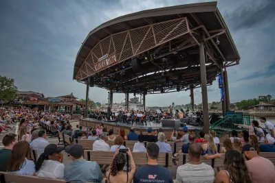 AdventHealth Orchestra on the AdventHealth Waterside Stage at Disney Springs.