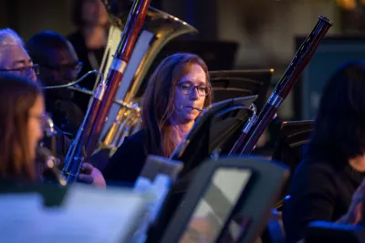 The AdventHealth employee orchestra performs at Disney Springs.