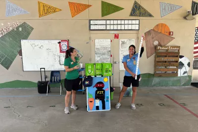 Two women perform a demonstration for the Mission Fit program.