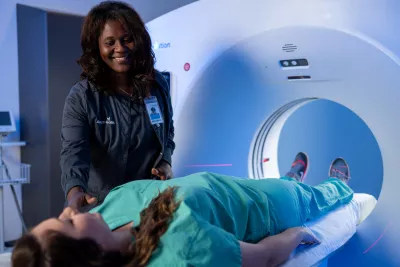 Woman about to get a CT scan.