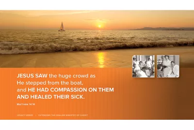 Sunset at the ocean with a sailboat in the water