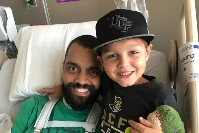 Brandon in the hospital with his son