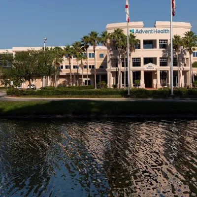 A lakeside view of AdventHealth Palm Coast