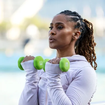 A woman lifting weights.