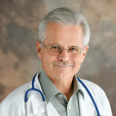 A portrait picture of author George Guthrie