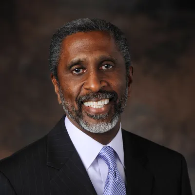 A portrait picture of author Louis Preston