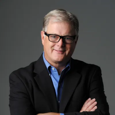 A portrait picture of author Shugart