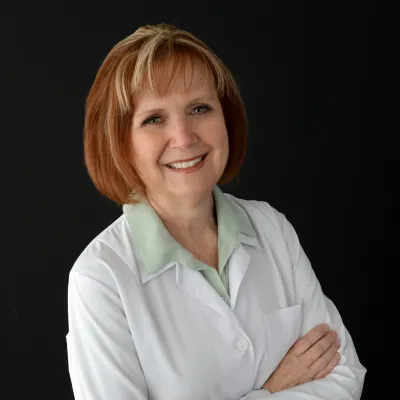 A portrait picture of author Sherri Flynt