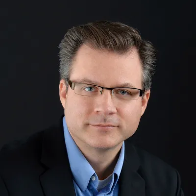 A portrait picture of author Todd Chobotar