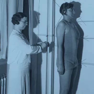 Doctor performing strength level tests