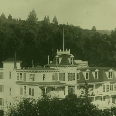 Battle Creek Sanitarium employees standing in front of a tent