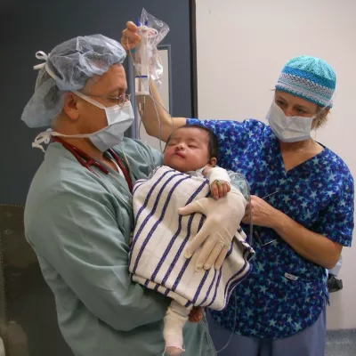 Picture of doctors taking care of a child