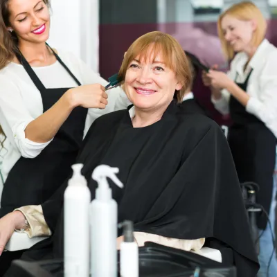 Woman getting a haircut