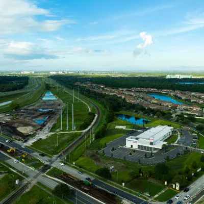 A vast view of AdventHealth Lake Nona and the surrounding neighborhood
