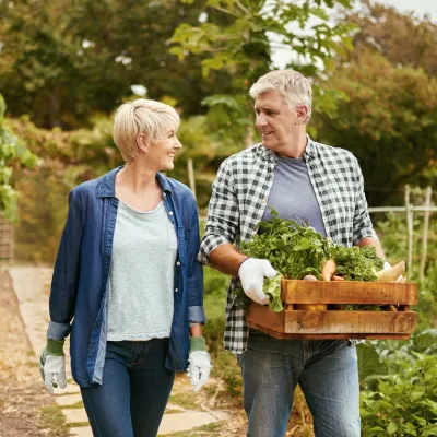 man and woman walking outdoors