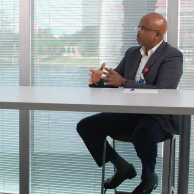 Dr. Hsu and Garrett Caldwell talking