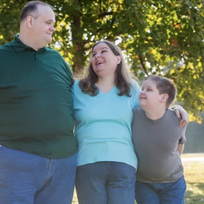 Family walking in the park.