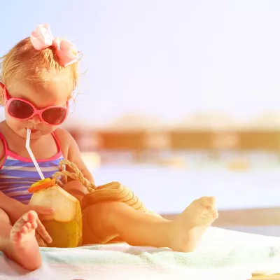 child relaxing in sun during the summer