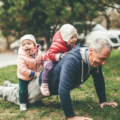 Man playing with children