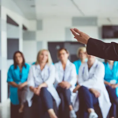 group of people meeting in a room