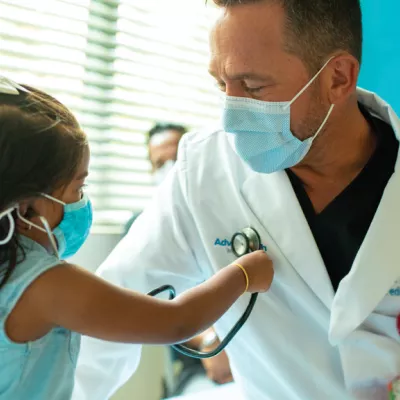 Doctor and Pediatric Patient