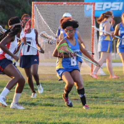 Students playing lacrosse