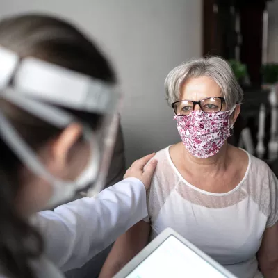 hero-doctor-comforting-patient-2000x1333