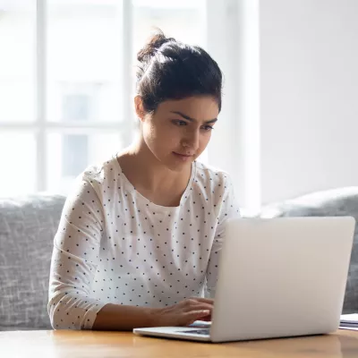 A woman doing research online.