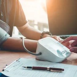 patient checking the blood pressure