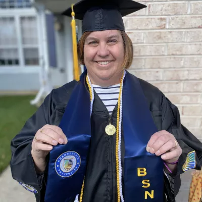 Ann Pettey in graduation robes