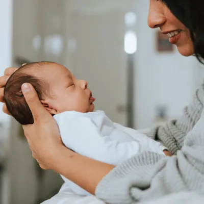 Mom holding infant