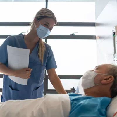 kind-nurse-checking-on-her-patient-2000x1333px