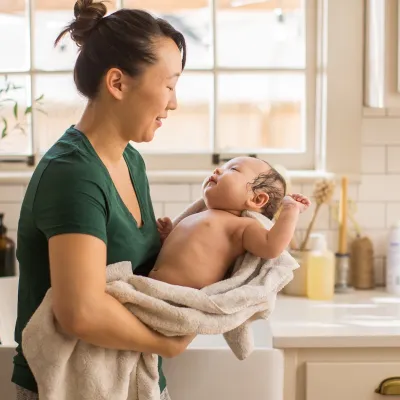 New Mom gives baby a bath