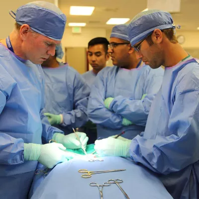 Surgeons Around Operating Table.
