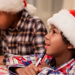 children writing Christmas letters
