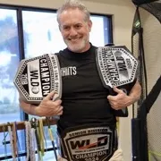 "Fast Eddie" Fernandes shows off his long drive world championship belts