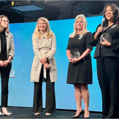 Left to Right: Amanda Maggard, Olesea Azevedo, Jayne Bassler and Audrey Gregory interacting during The Joy Project 2022 Summit.