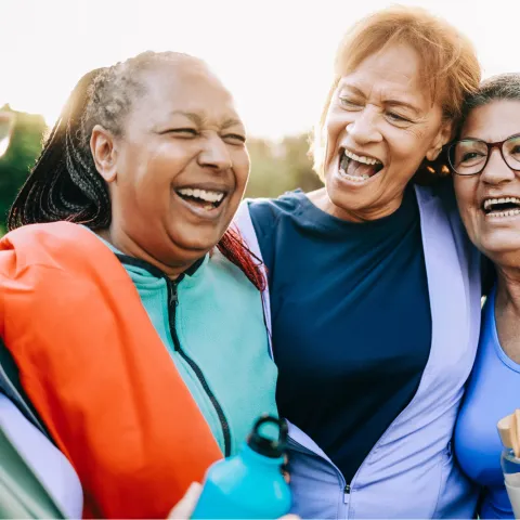 A Group of Senior Women Take a Break From a Run to Share a Laugh