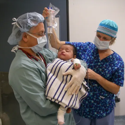 Picture of doctors taking care of a child