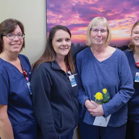 Nancy Peterson with Dr. Lungus's Team