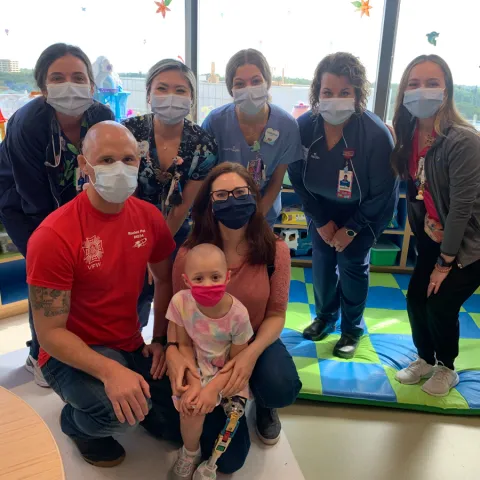 daniel webb with his daughter and staff at adventhealth for children