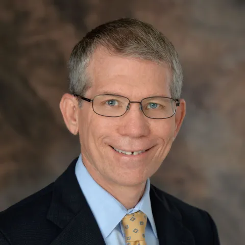 A Headshot of Author Peter Weiss