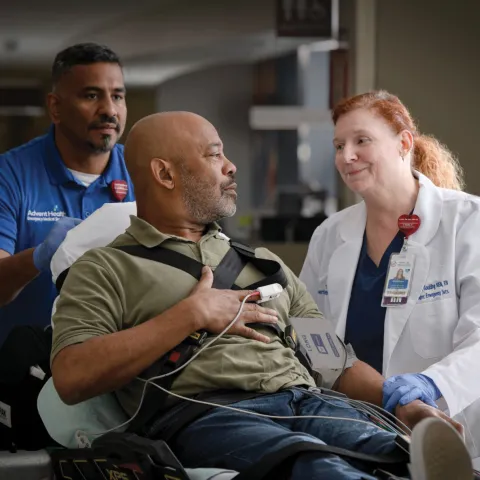 Patient with doctor going into in Emergency Room.