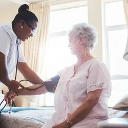 Caregiver taking care of a patient