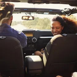 A family driving in a car.